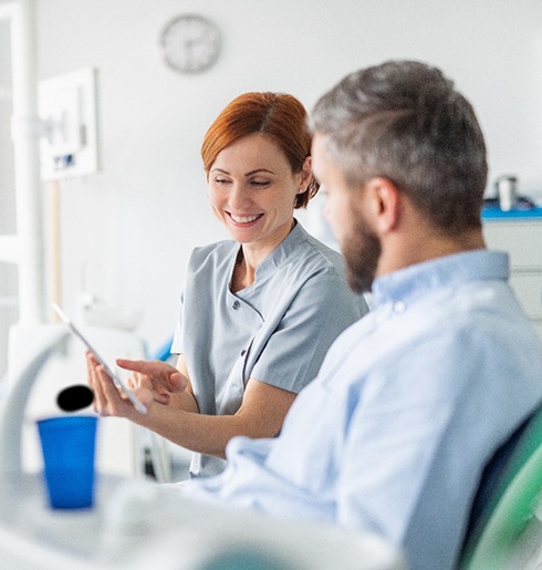 Emergency dentist in Pea Ridge talking to patient