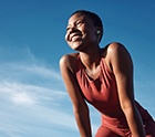 Lady smiles outdoors
