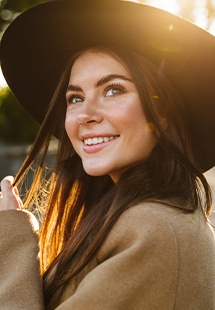 woman with hat smiling in Bella Vista